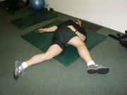 Back Stretching: Laying twisting stretch
