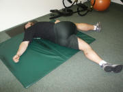 Back Stretching: Laying twisting stretch