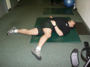 Back Stretching: Laying twisting stretch