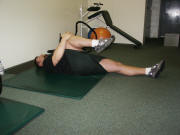 Leg Stretching: double and single leg pulls lying
